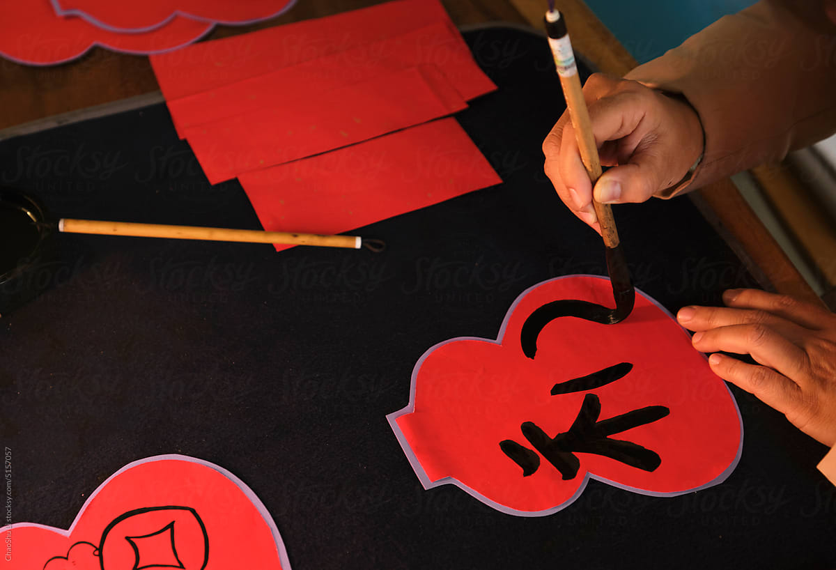 Make traditional Chinese New Year brush calligraphy decorations