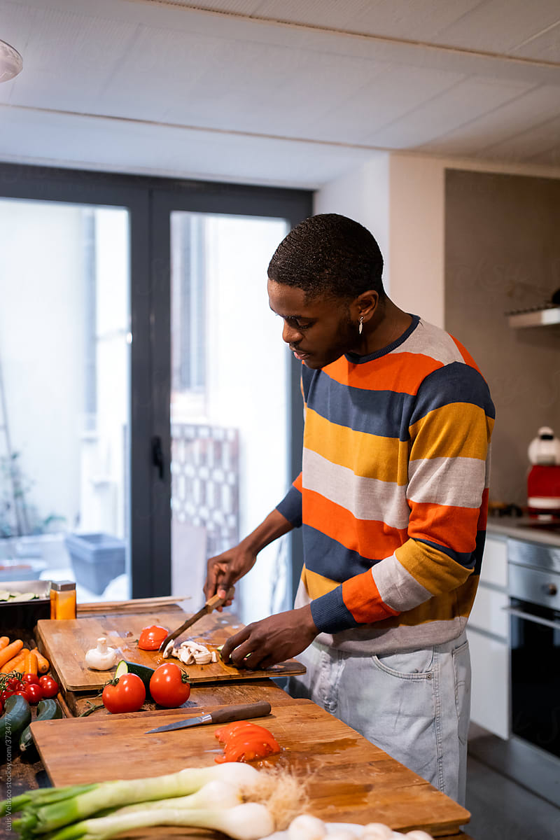 black man cooking