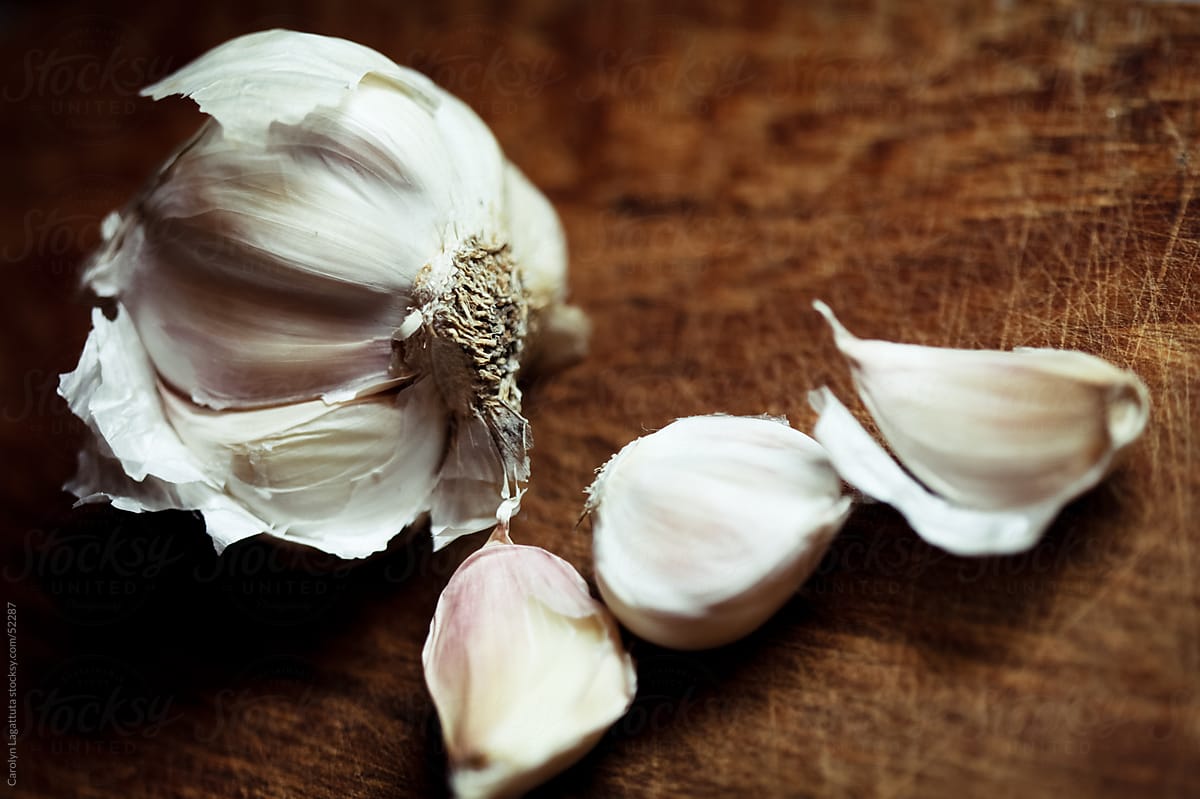 Garlic bulb on a cutting board