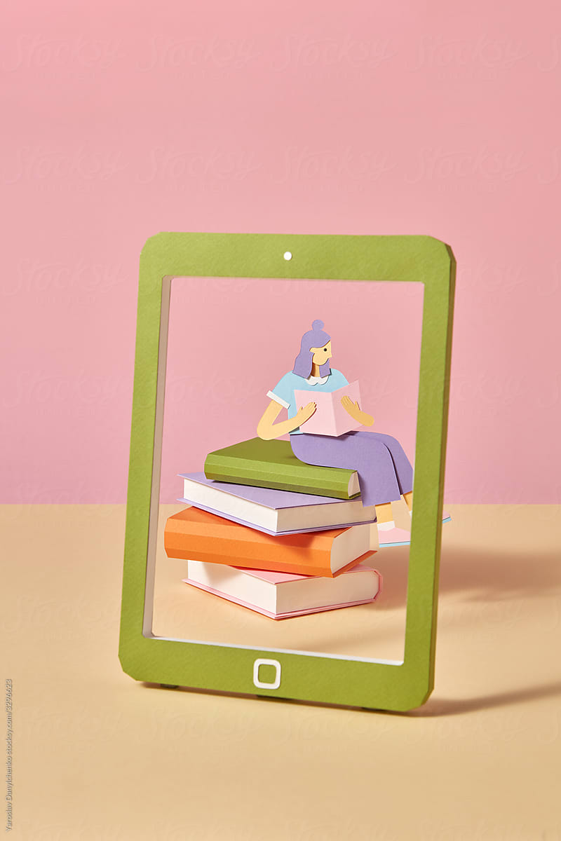 Papercraft tablet screen with girl studing online.