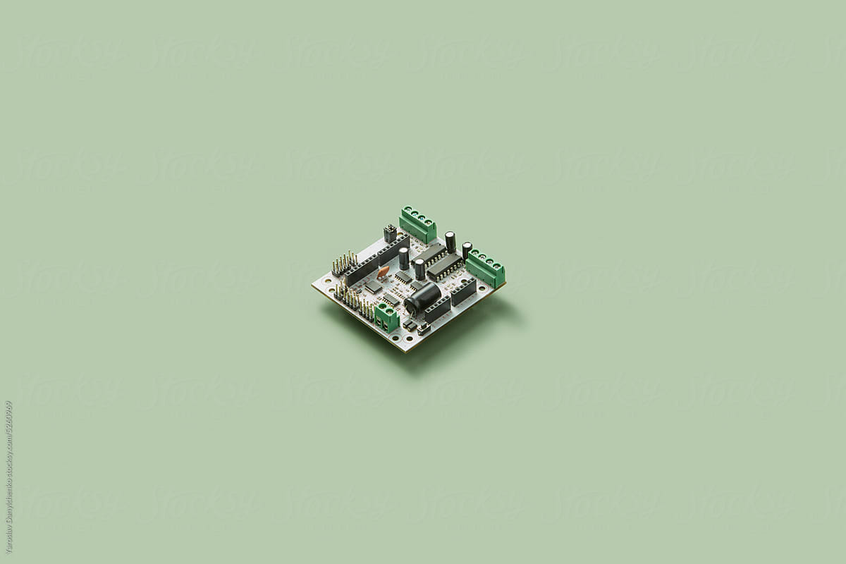 Single electronic microchip on green background.