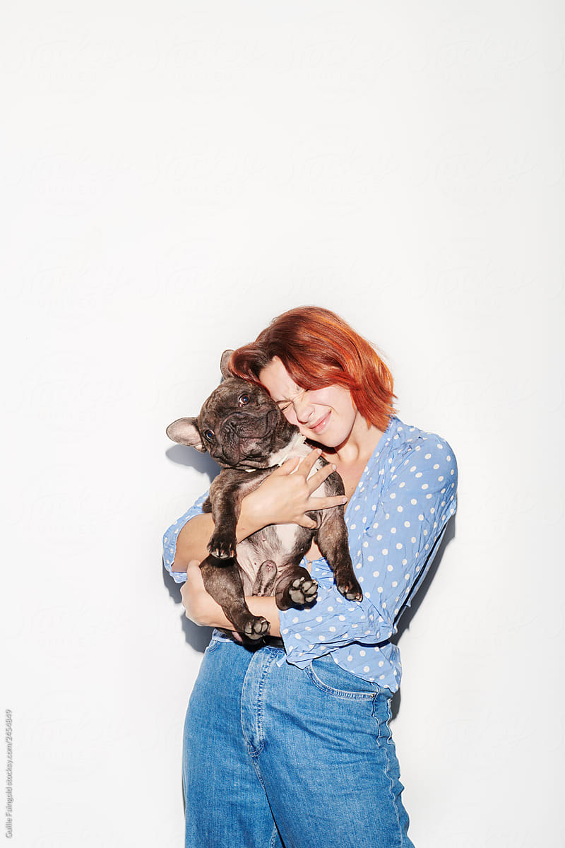 Woman hugging dog