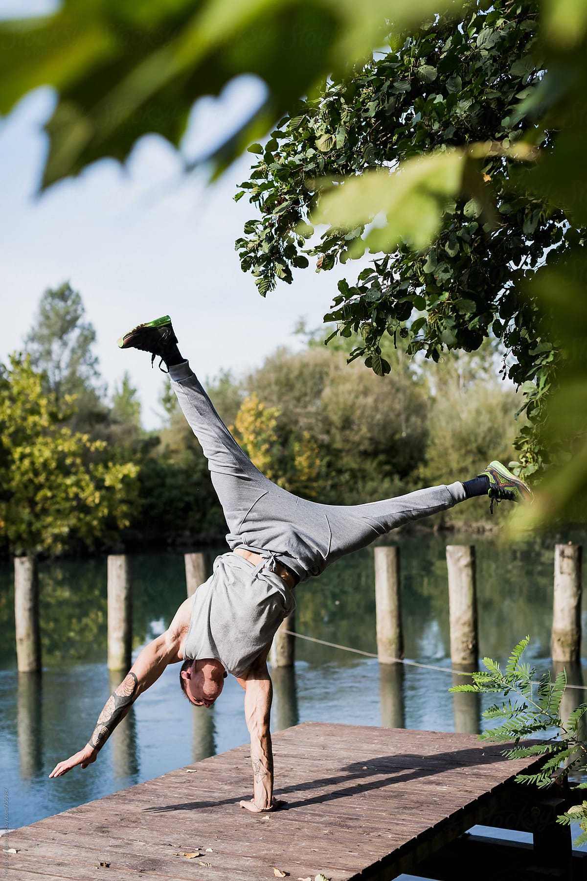 Man doing Handstand in nature