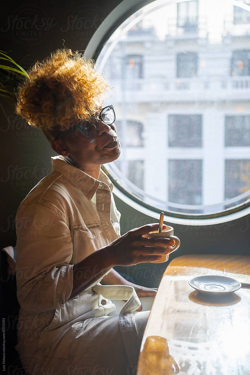 Cool Black Woman Having A Hot Cup Of Coffee.