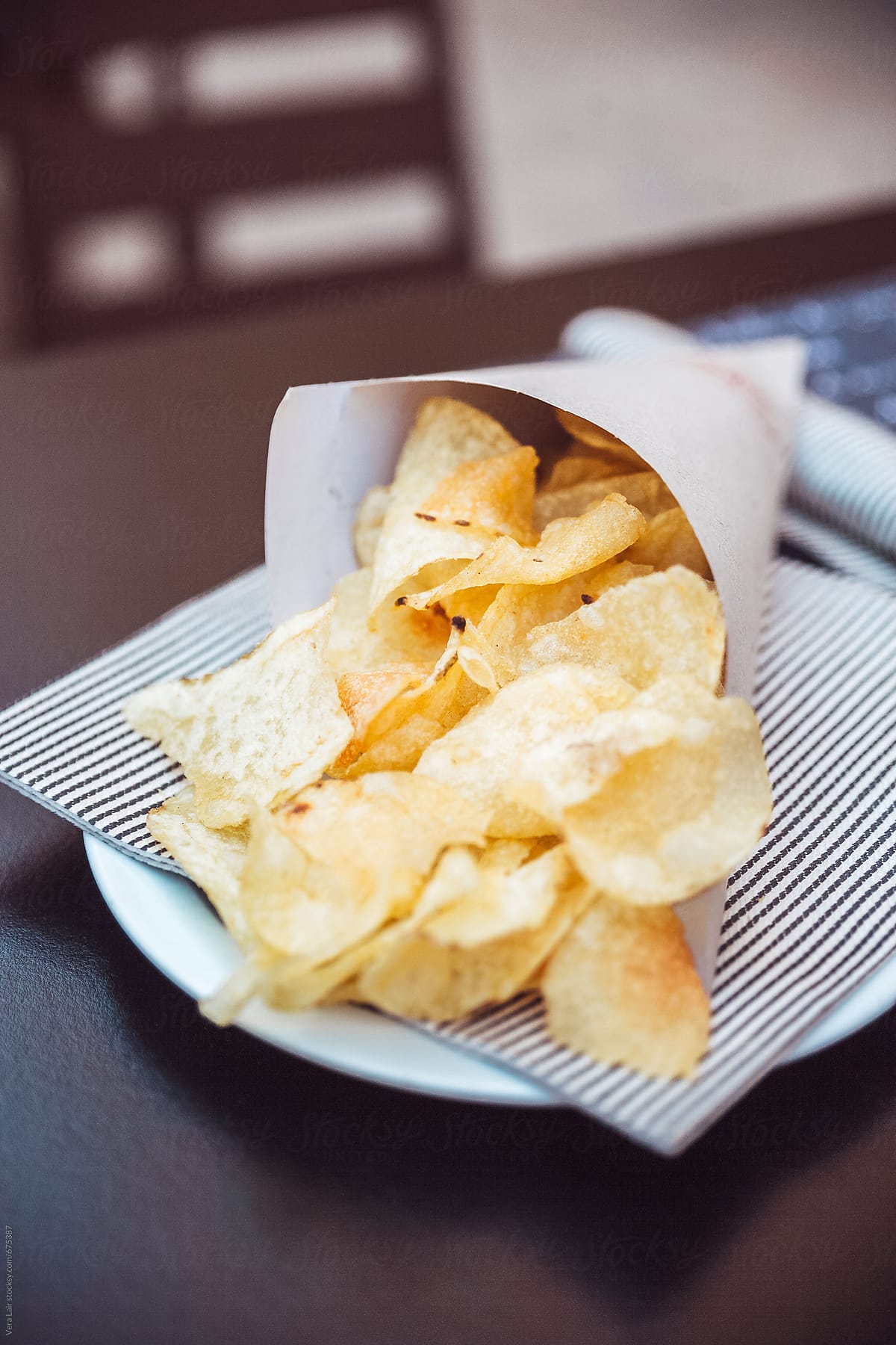 Potato chips on a paper bag
