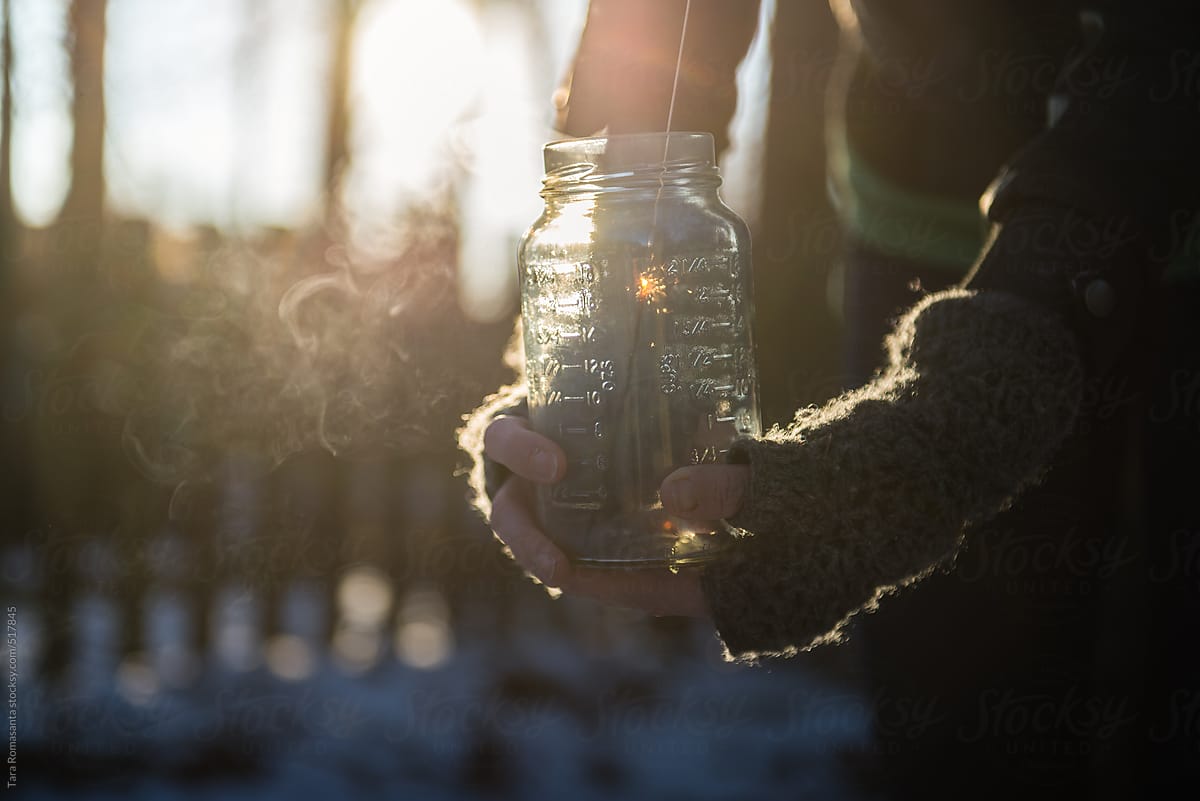 Woman Holds A Sparkler Inside A Mason Jar By Tara Romasanta Photography