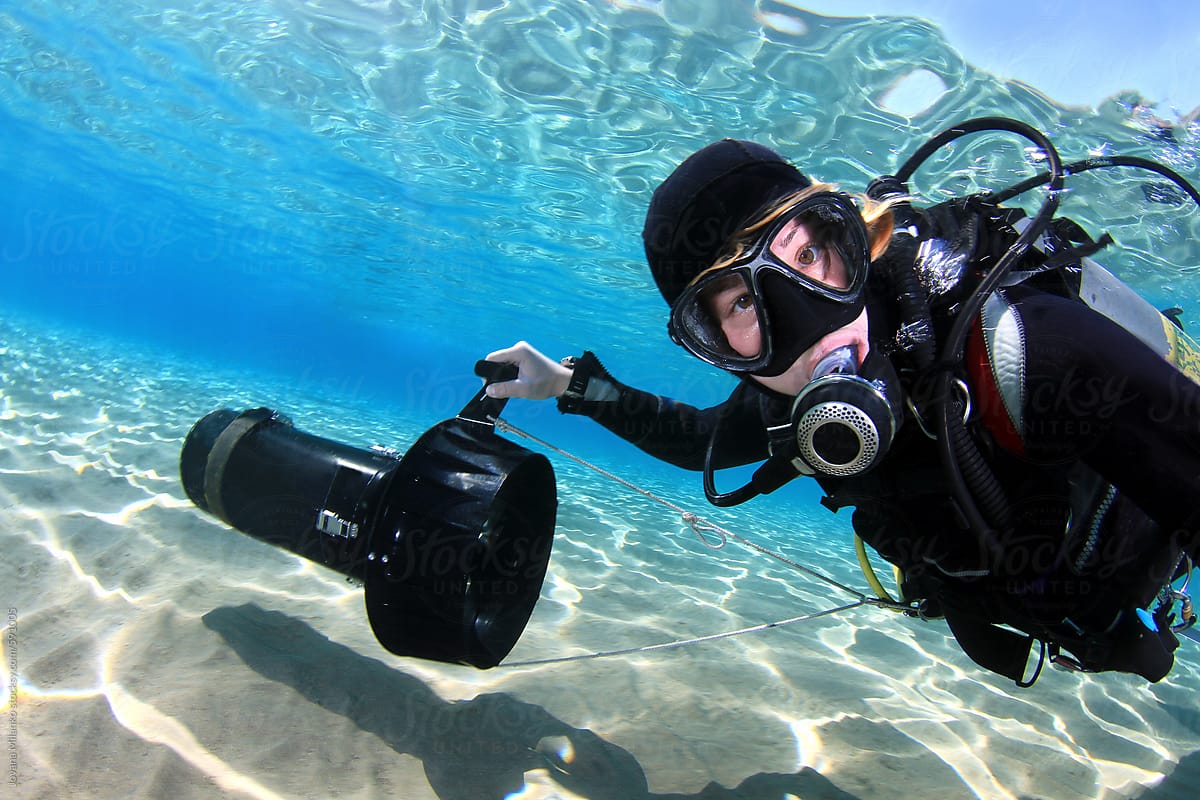 Woman taking an Underwater Selfie while driving DPV