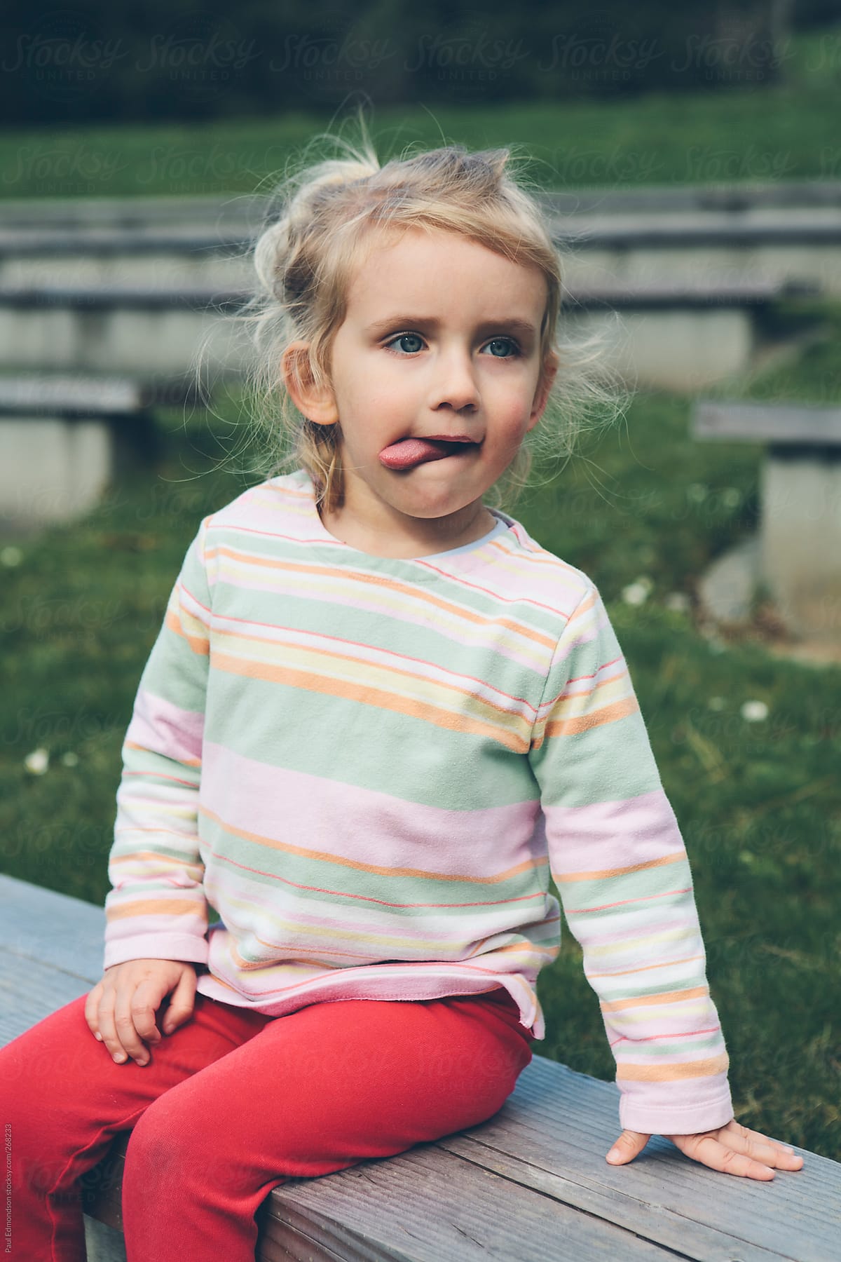 Cute Three Year Old Girl Making Funny Faces By Stocksy Contributor 
