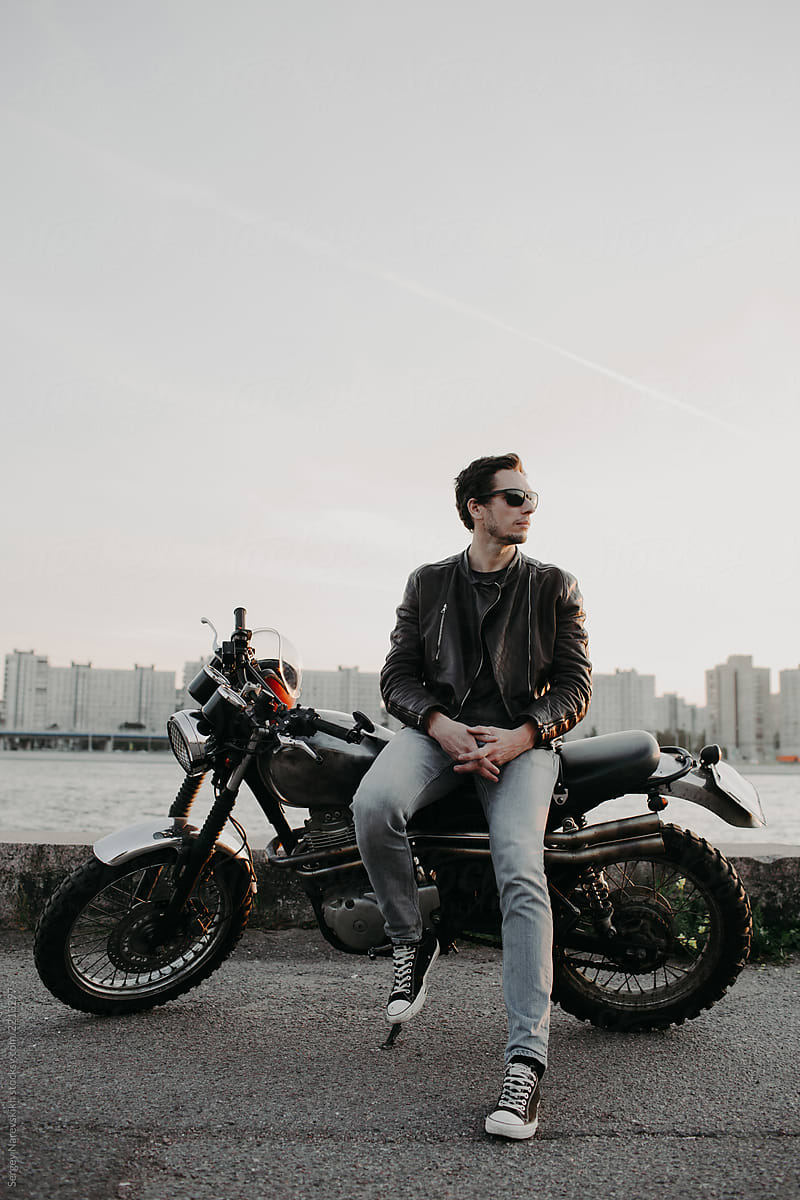Male sitting on motorcycle