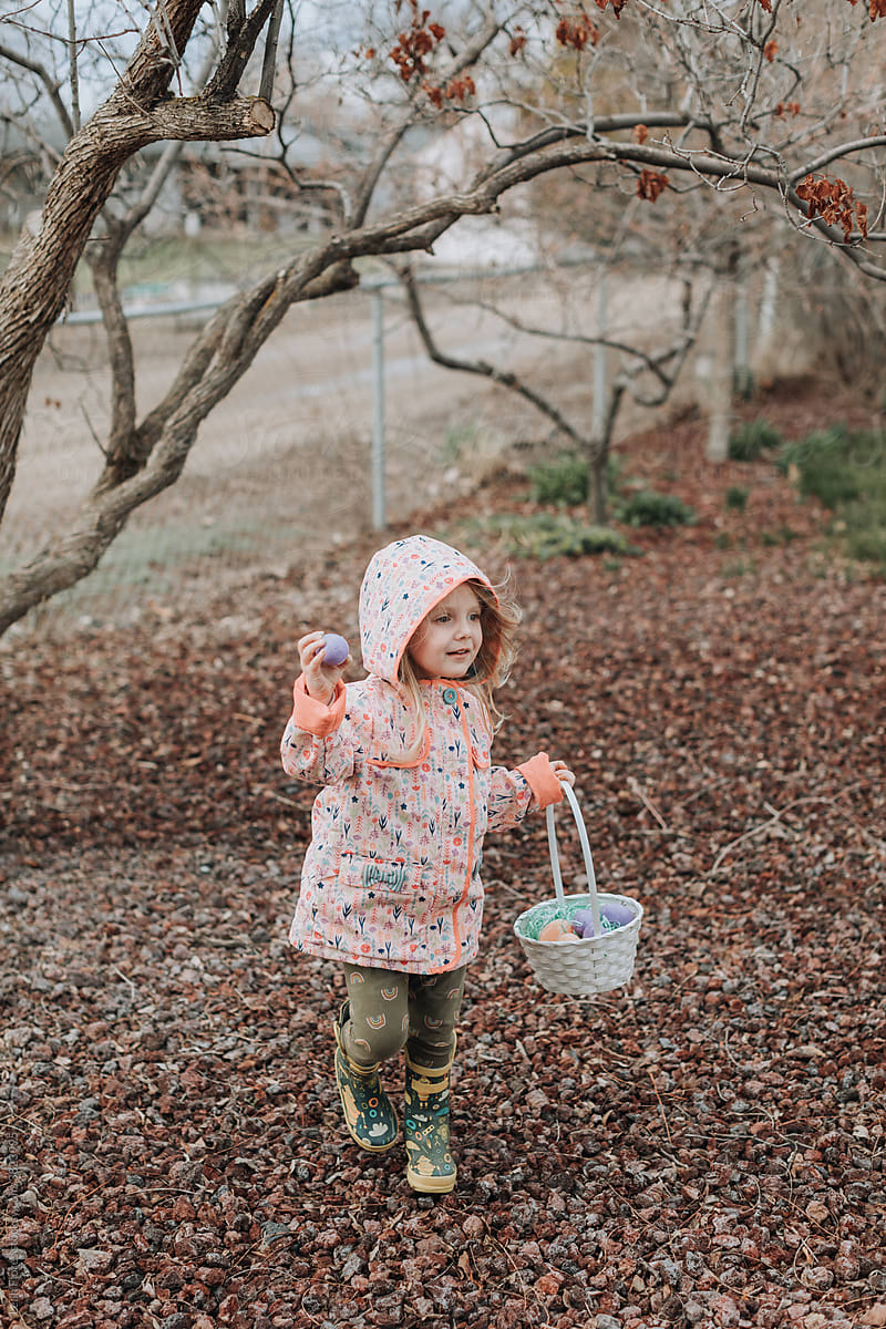 Young Girl Finding an Easter Egg