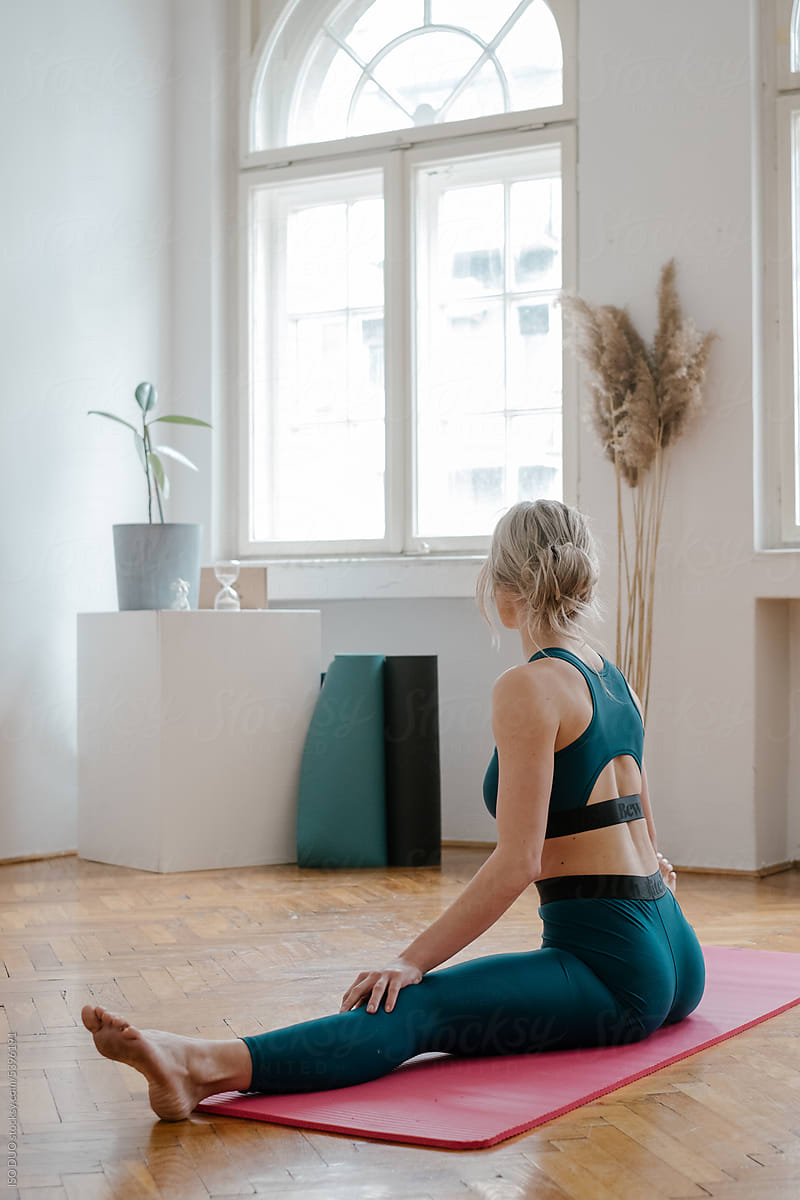 Focused Female Achieving Balance Through Yoga