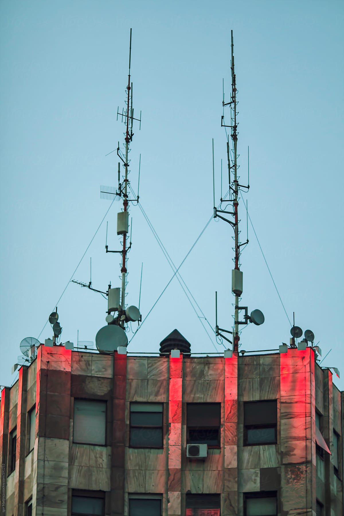transmitter and antenna on top of the building, twilight