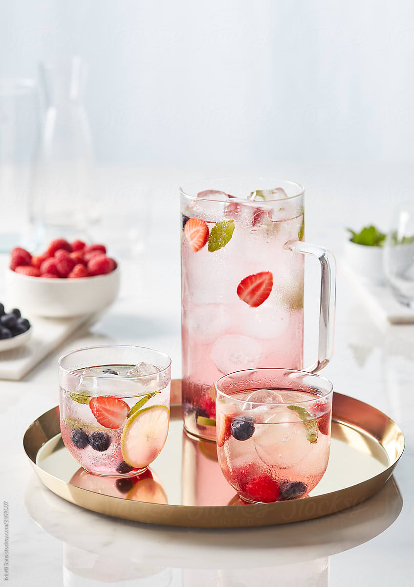 Sweet red water with berries and lime.