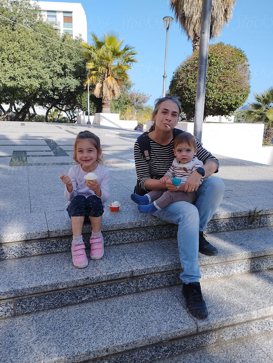 Ice Cream Delight: Sweet Moments with Mom and Kids in the Square