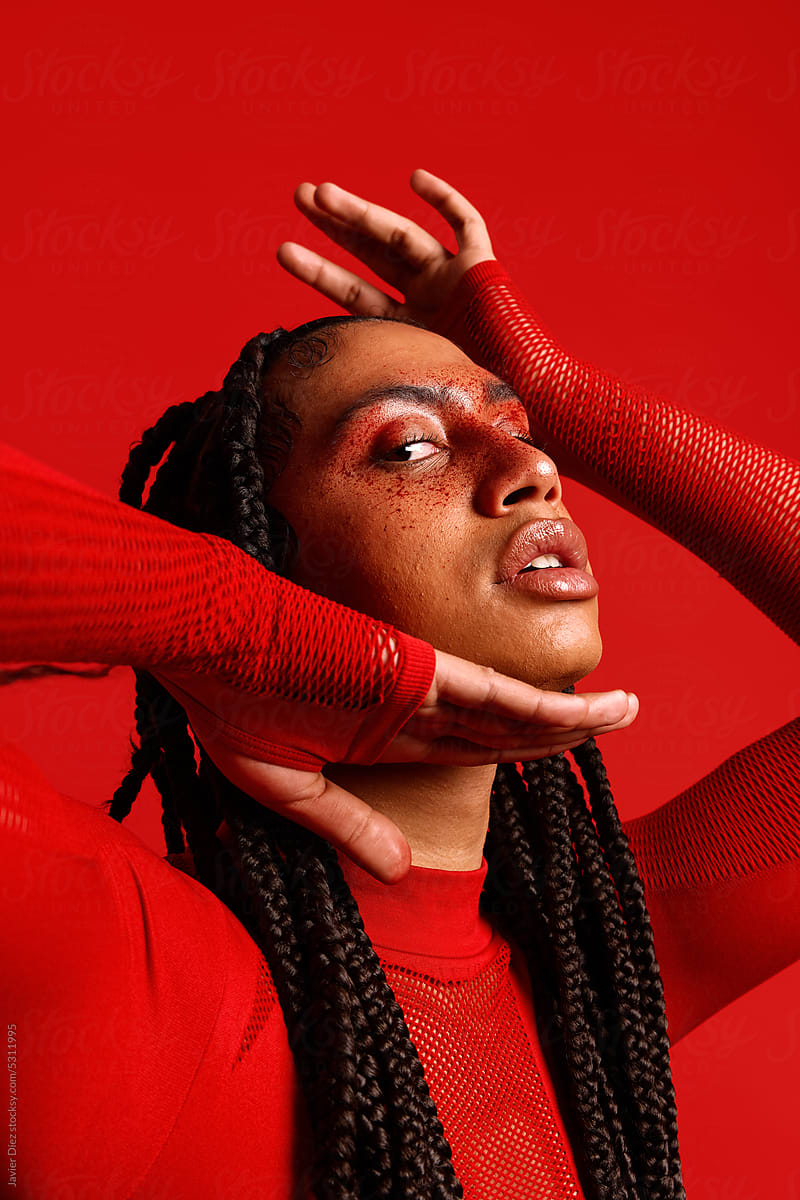 Female model against red background