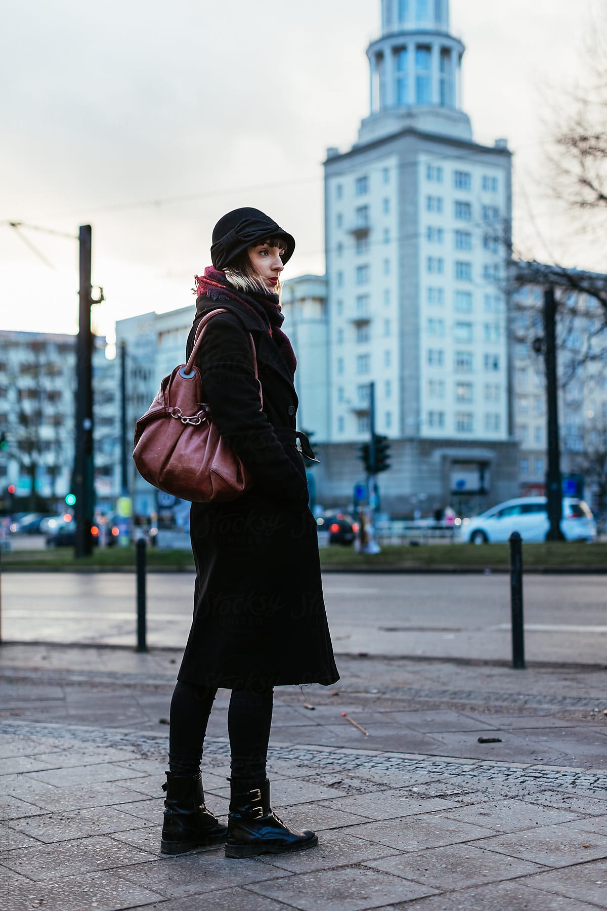 Woman walking in the city in winter