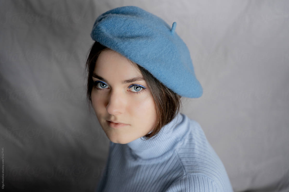 Woman In Blue Beret and Blue Turtleneck