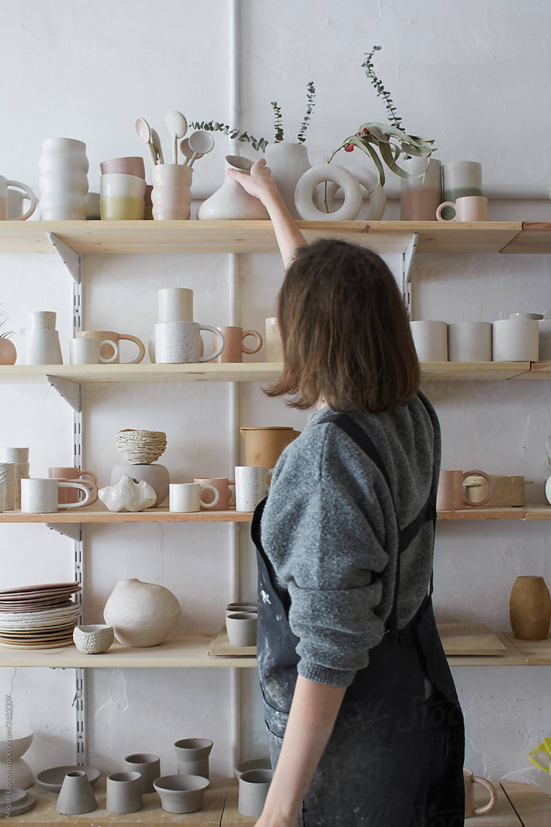 Ceramist in her pottery shop