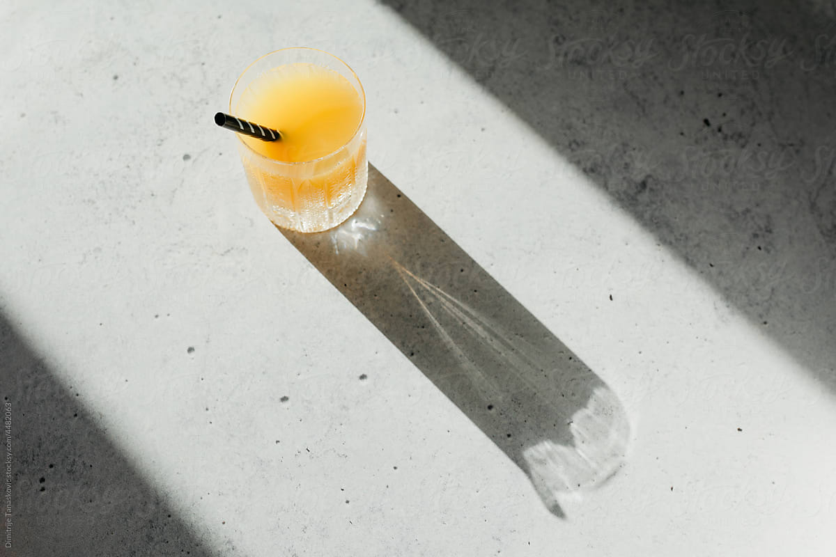 Orange Juice On Gray Backdrop.