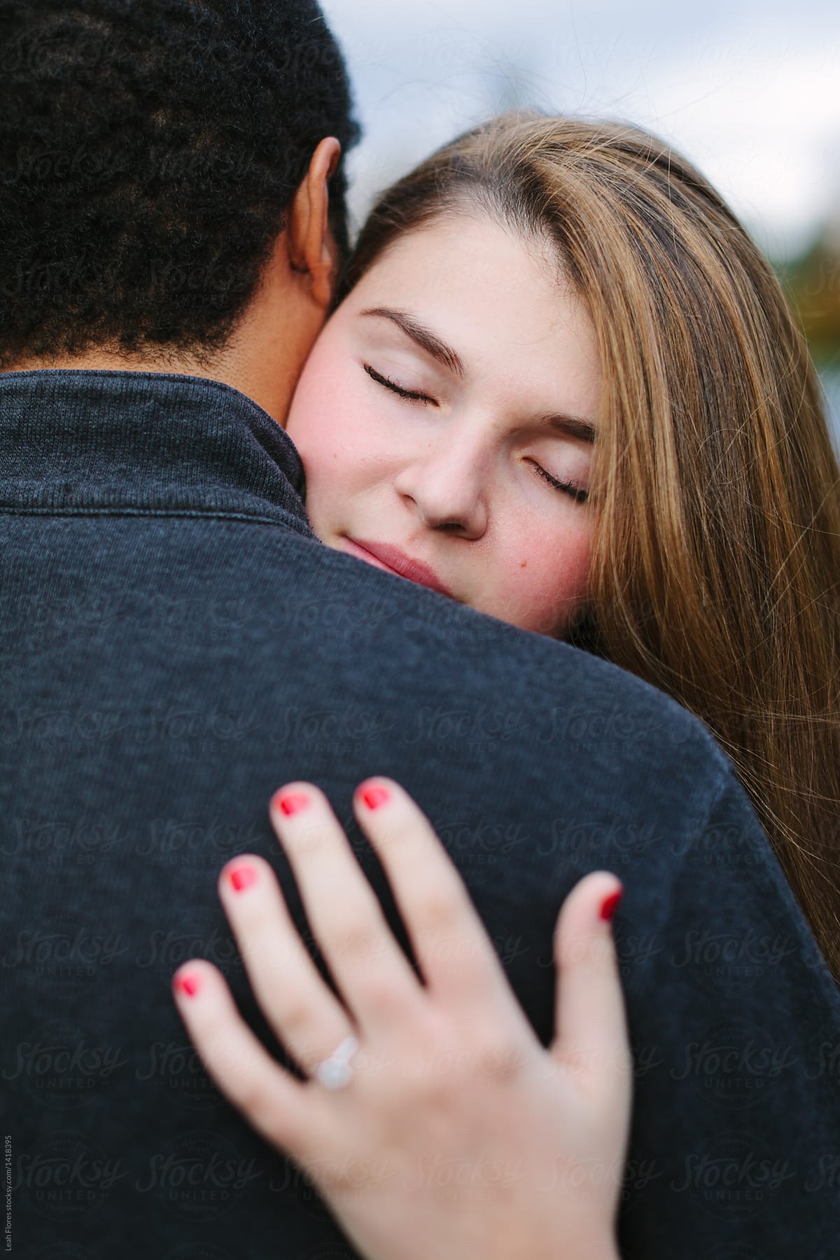 Man Hugging Woman Around Waist by Stocksy Contributor Leah Flores -  Stocksy