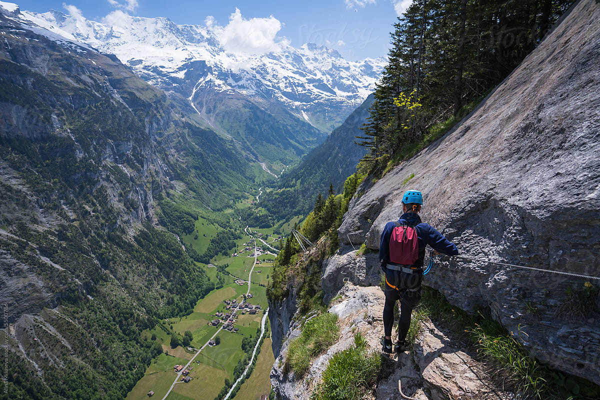 Man Climbing Via Ferrata Above Lauterbrunnen Valley