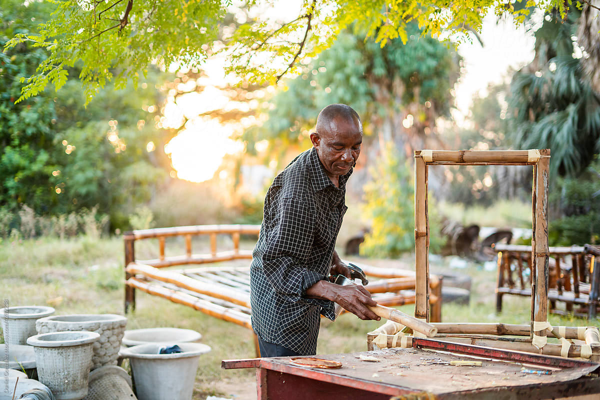 Woodworker in outdoor workshop