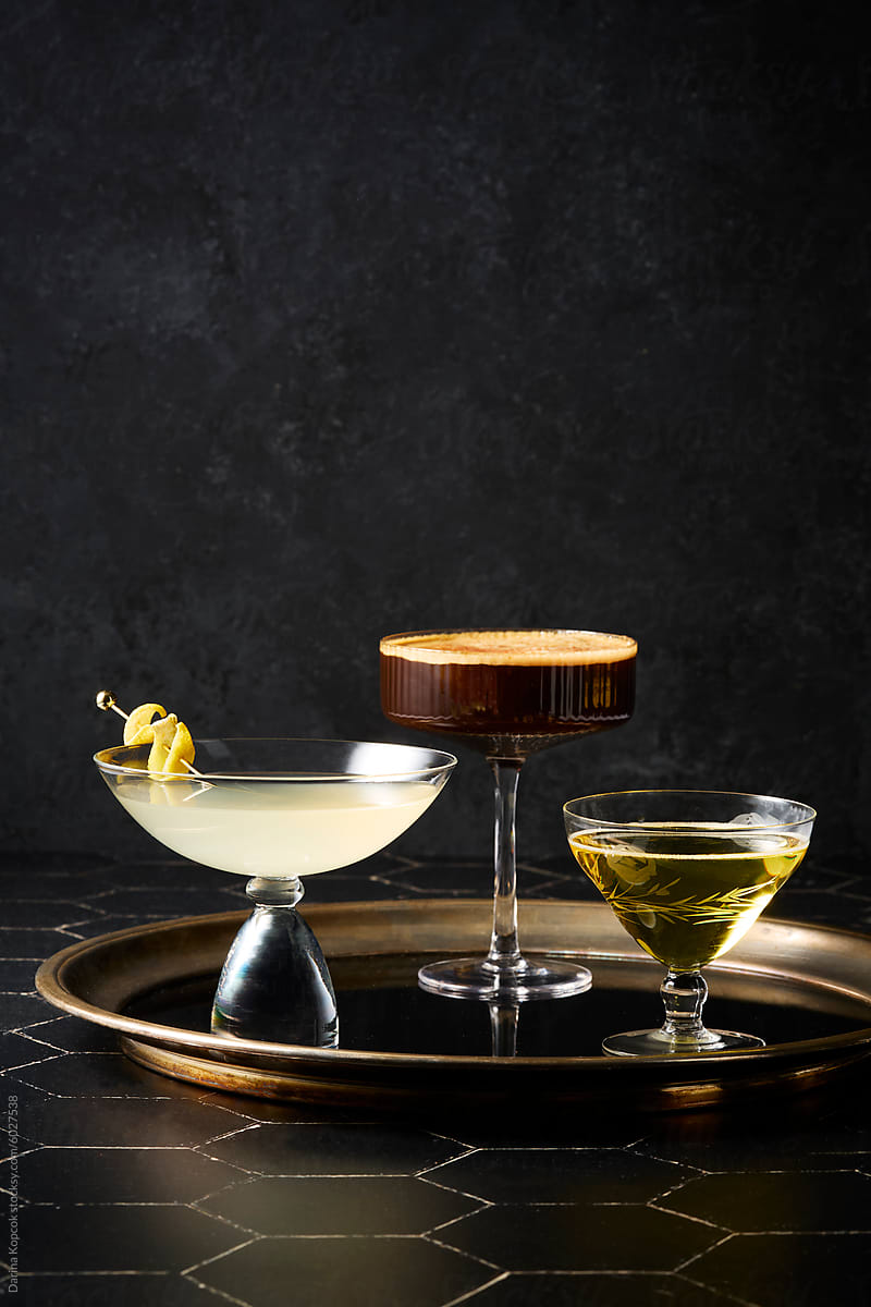Three Cocktails on a Brass Tray