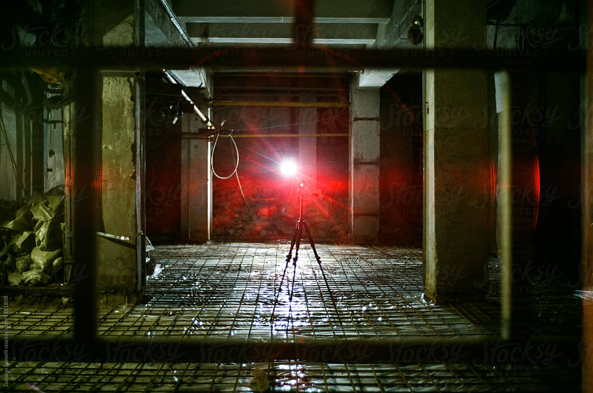 Laser measuring device in use on concrete construction sites