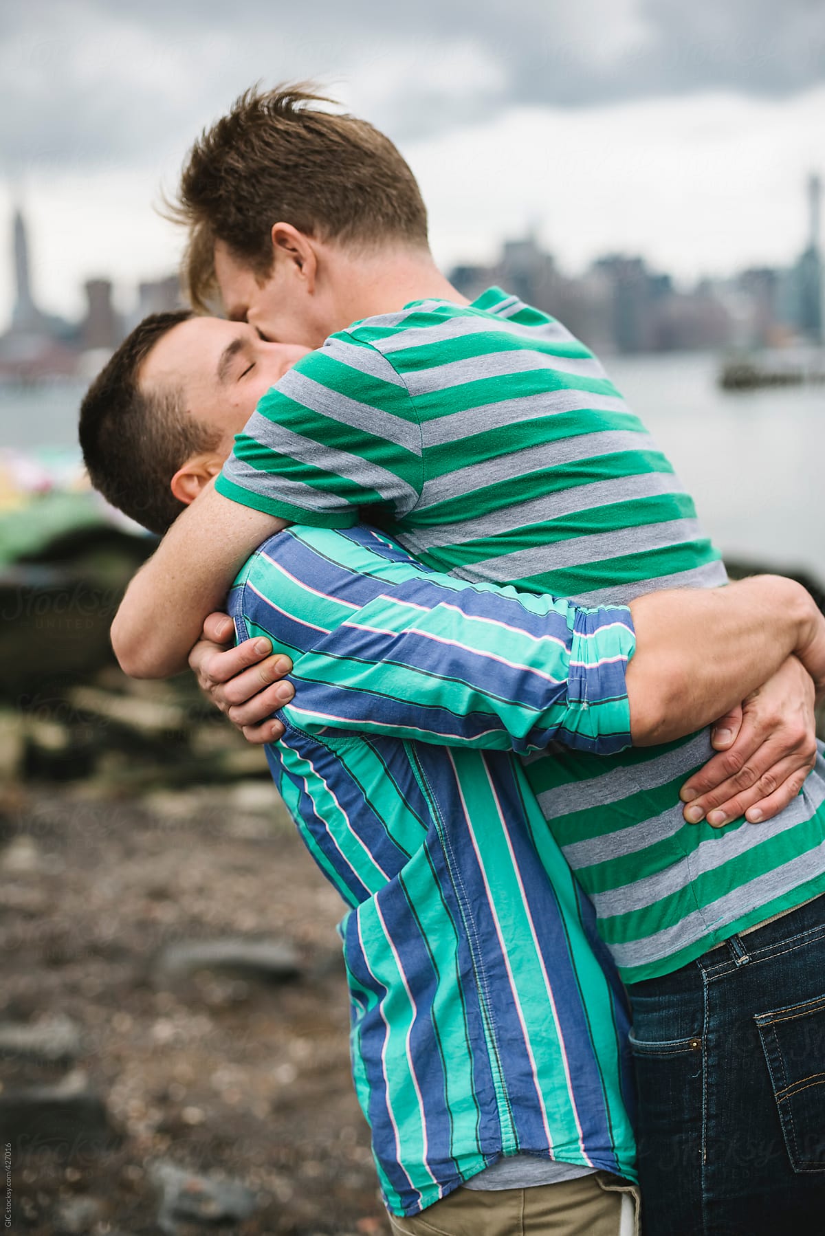Happy Gay Couple Hugging Outdoors By Stocksy Contributor Simone Wave