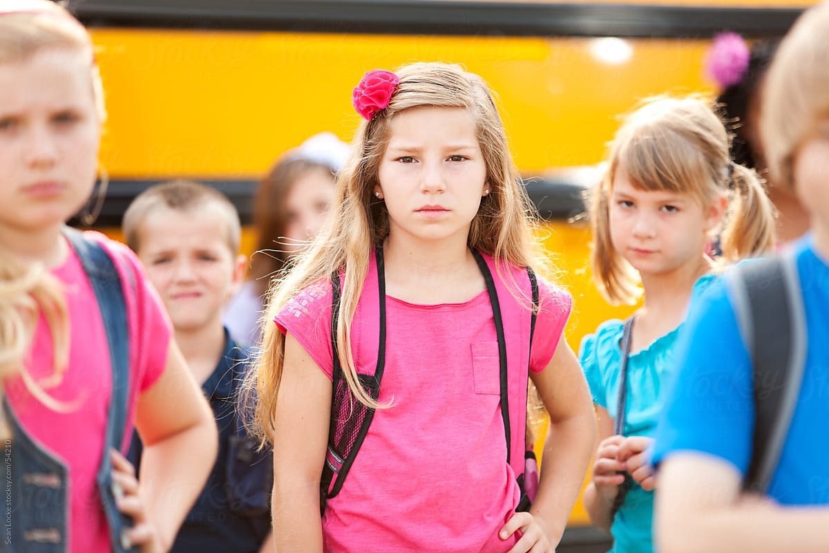 School Bus: Focus on Girl with Serious Look