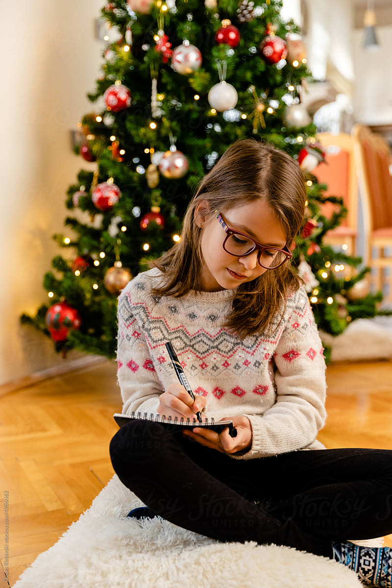 Girl writing letter to Santa