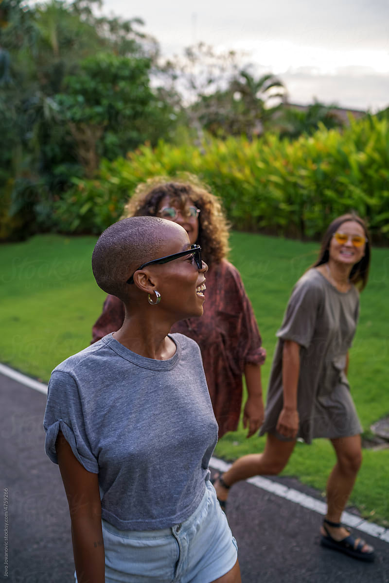 Young black woman enjoying time with friends on walk