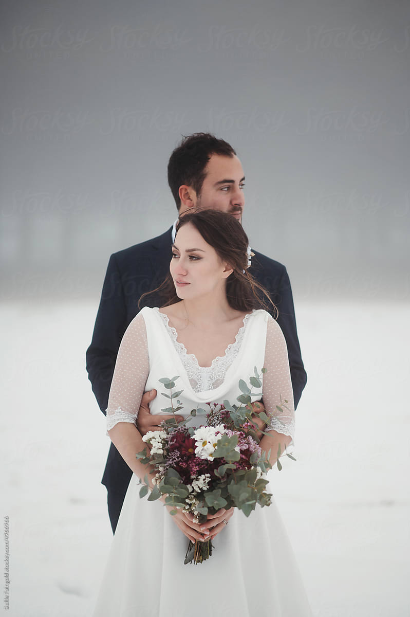 Newlyweds on misty day