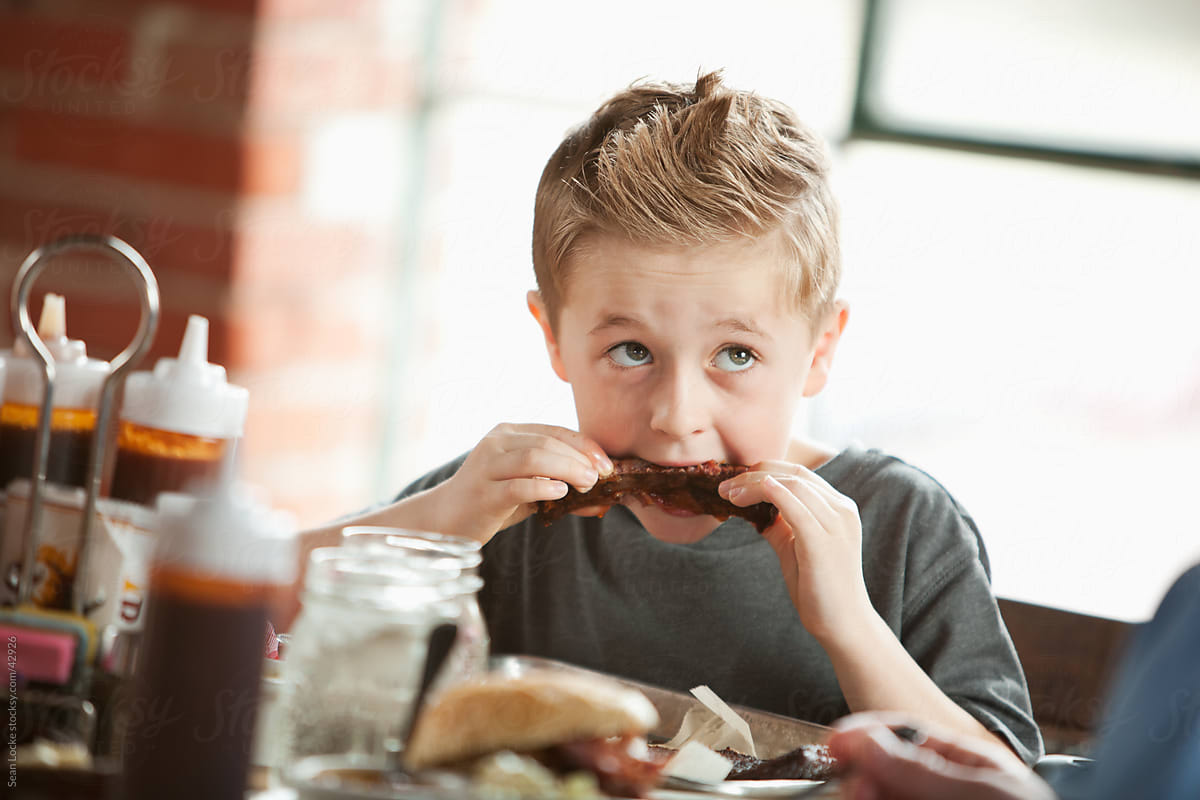 Barbeque: Little Boy Gets Into Eating Ribs