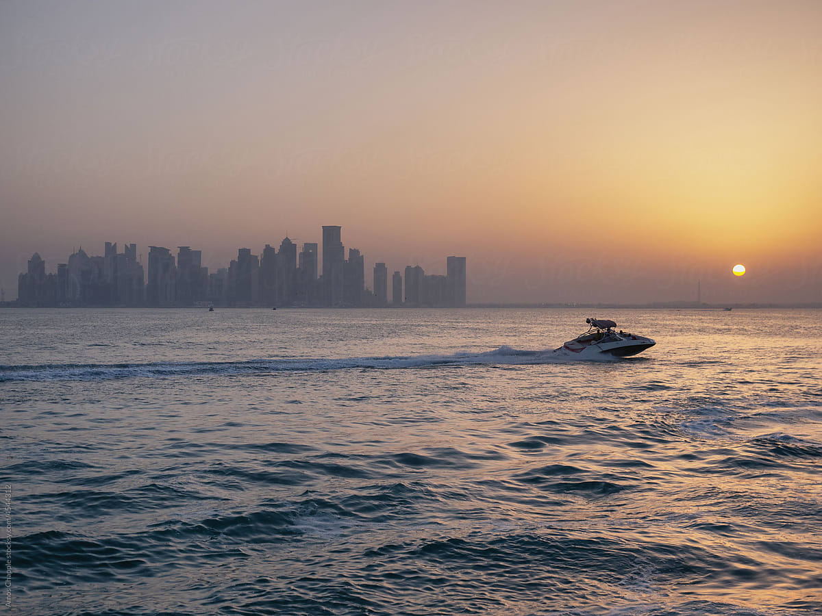 A boat speeds through waters off Qatar