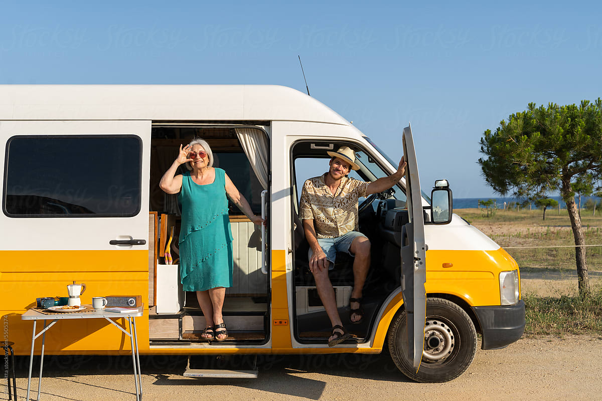 retired woman and son in camper van