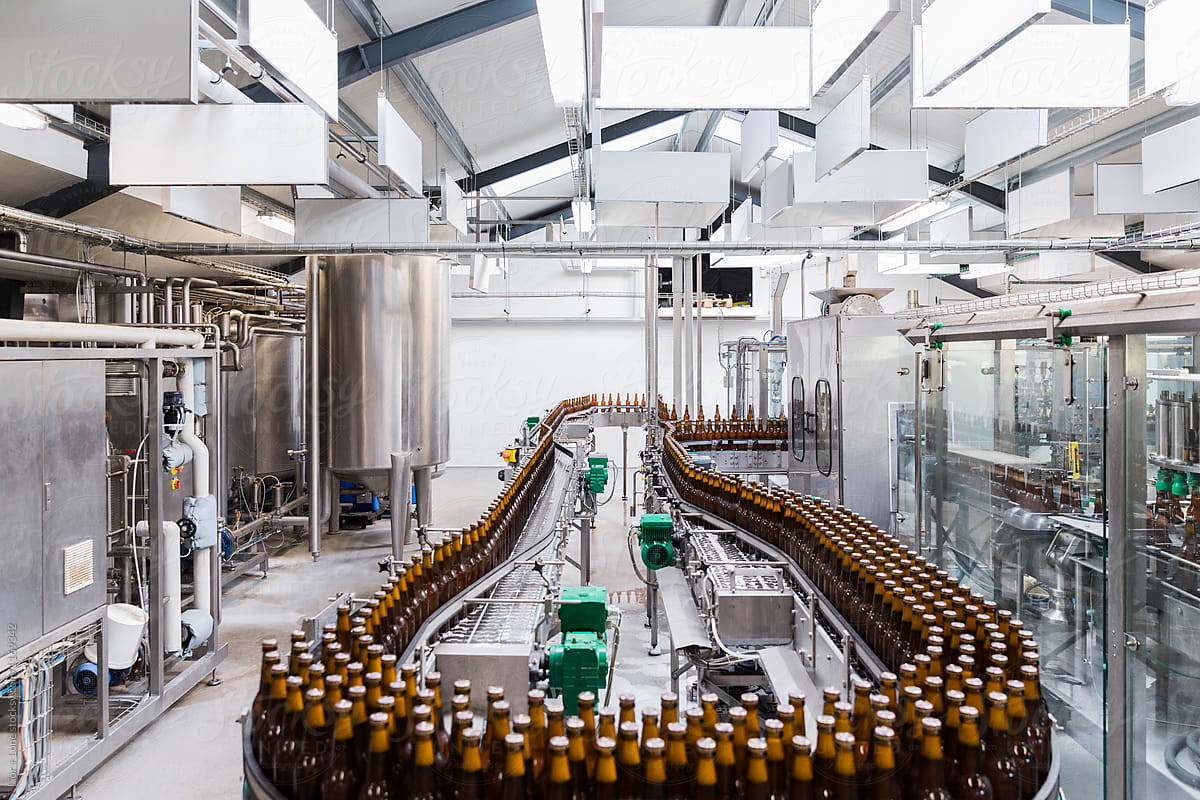 Beer bottles assembly line in a brewery factory