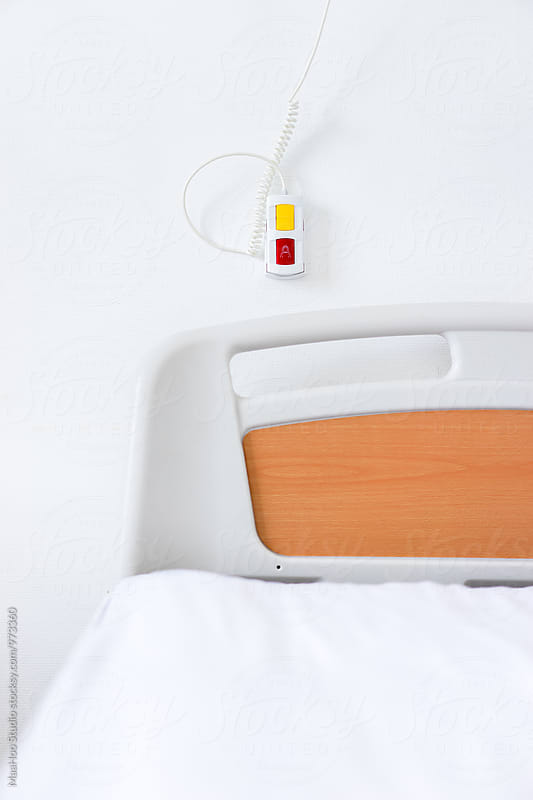 Hospital bed remote alarm