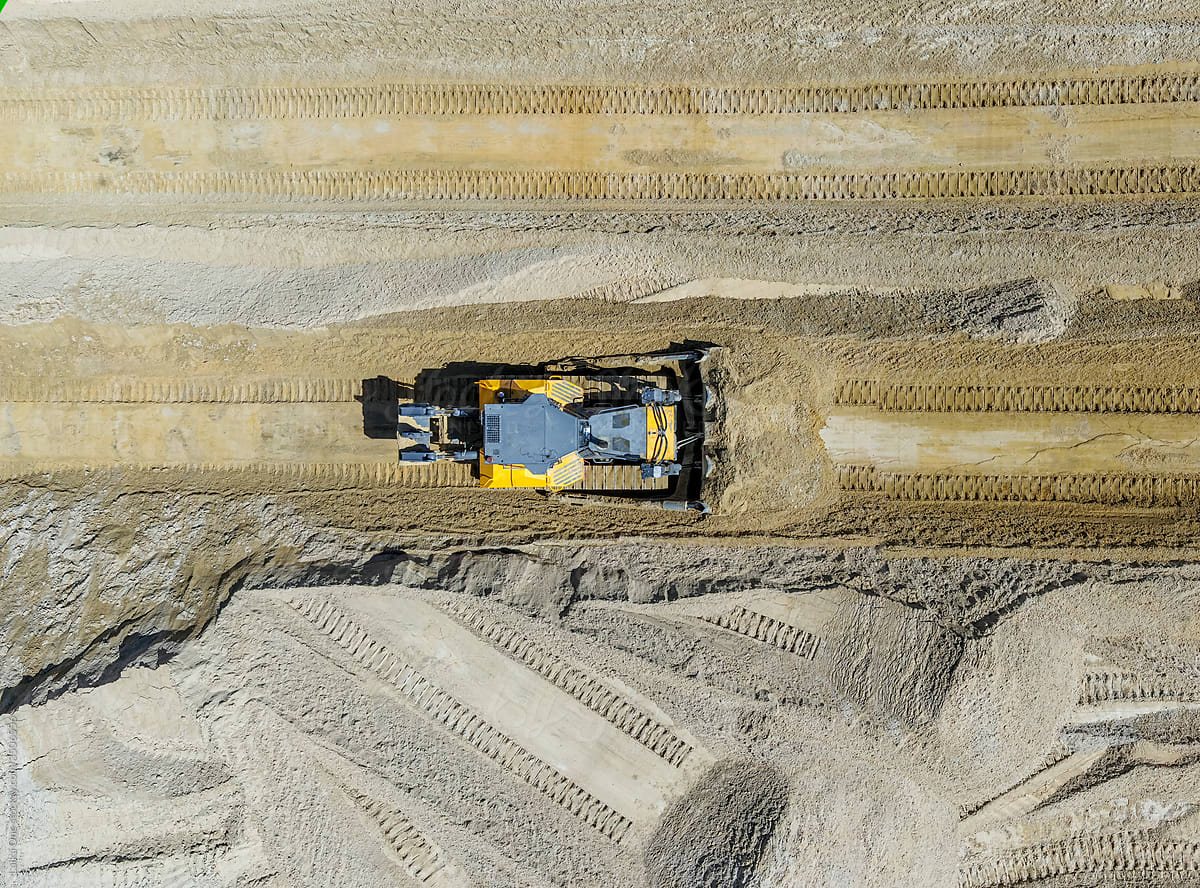 Aerial view of a bulldozer in a quarry