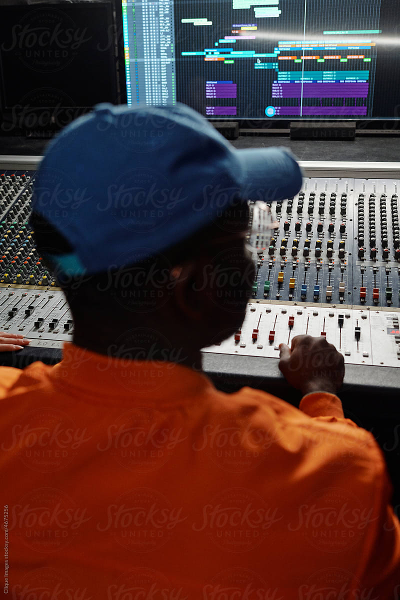 African American Man Working In Recording Studio