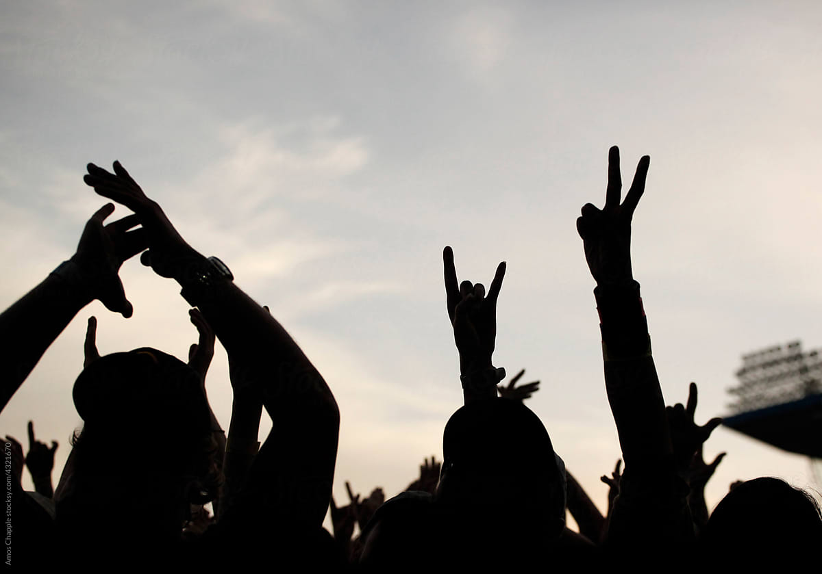 Cheering crowds at a rock concert