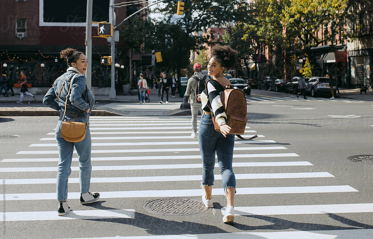Girls Walking on Crosswalk in New York City