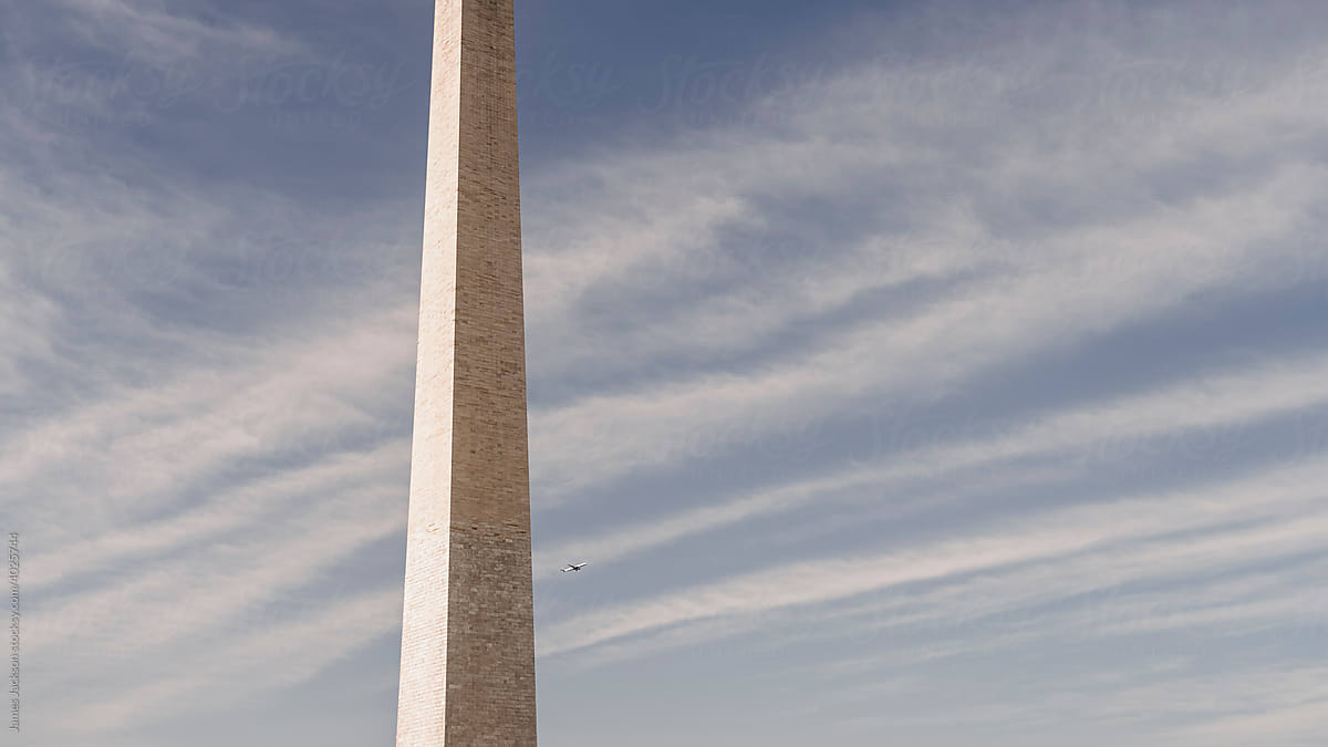 Washington Monument with airplane