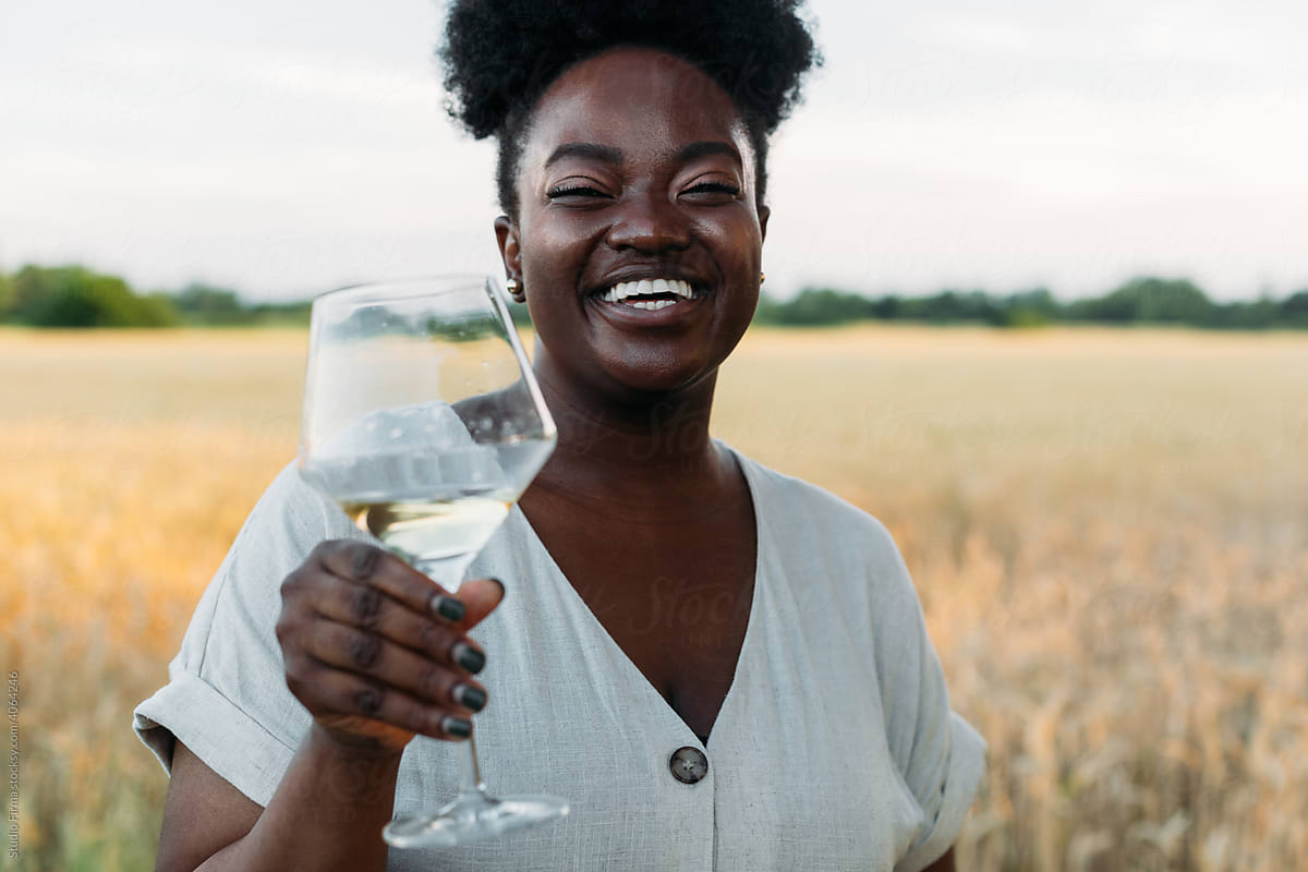 Woman Drinking Wine in Nature