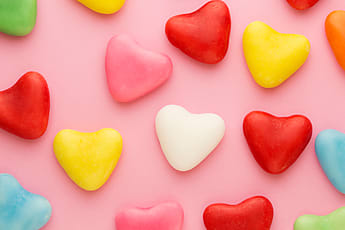 Lucky Love Heart Shaped Candles As Four Leaf Clover Stock Photo - Download  Image Now - iStock