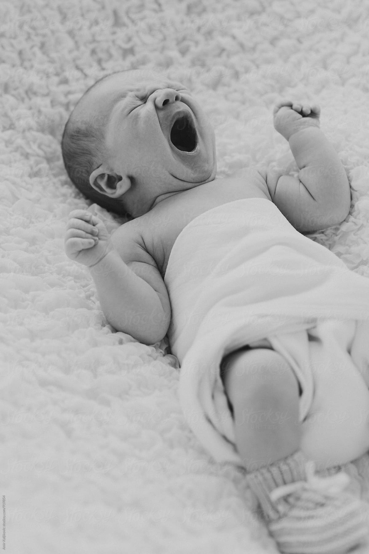 Newborn yawning