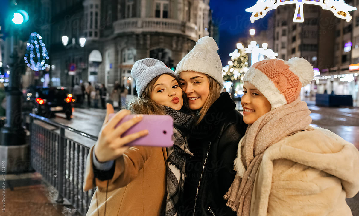 Three young women in the city