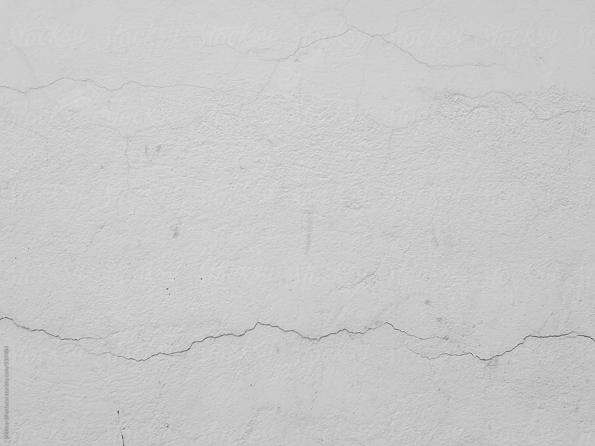 Crack on a white wall.
