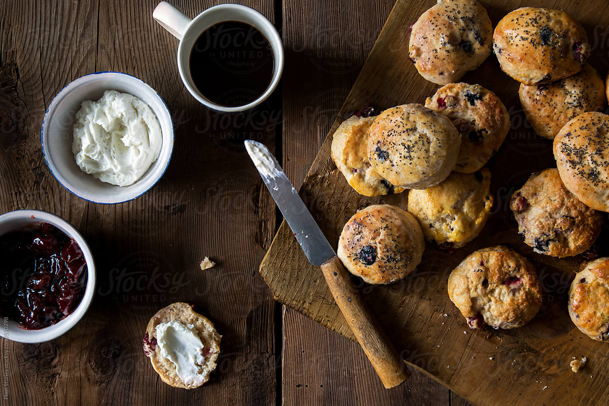 Cranberry scones on wooden table