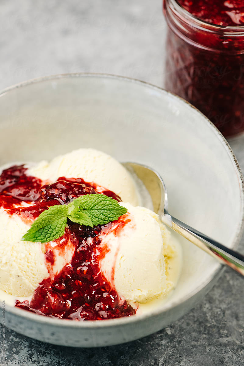 Berry compote over vanilla ice cream
